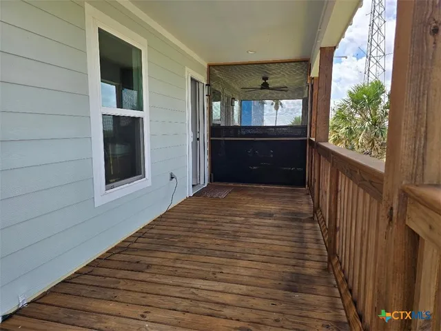 a view of balcony and wooden floor