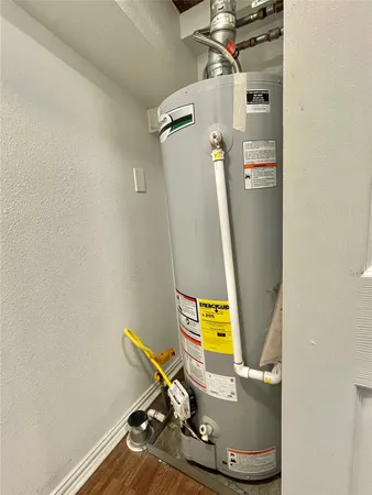 a room with a wooden floor and a table