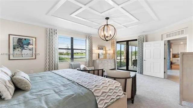 a view of a livingroom with furniture and a chandelier