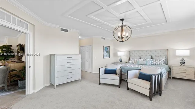 a view of a patio with a table and chairs