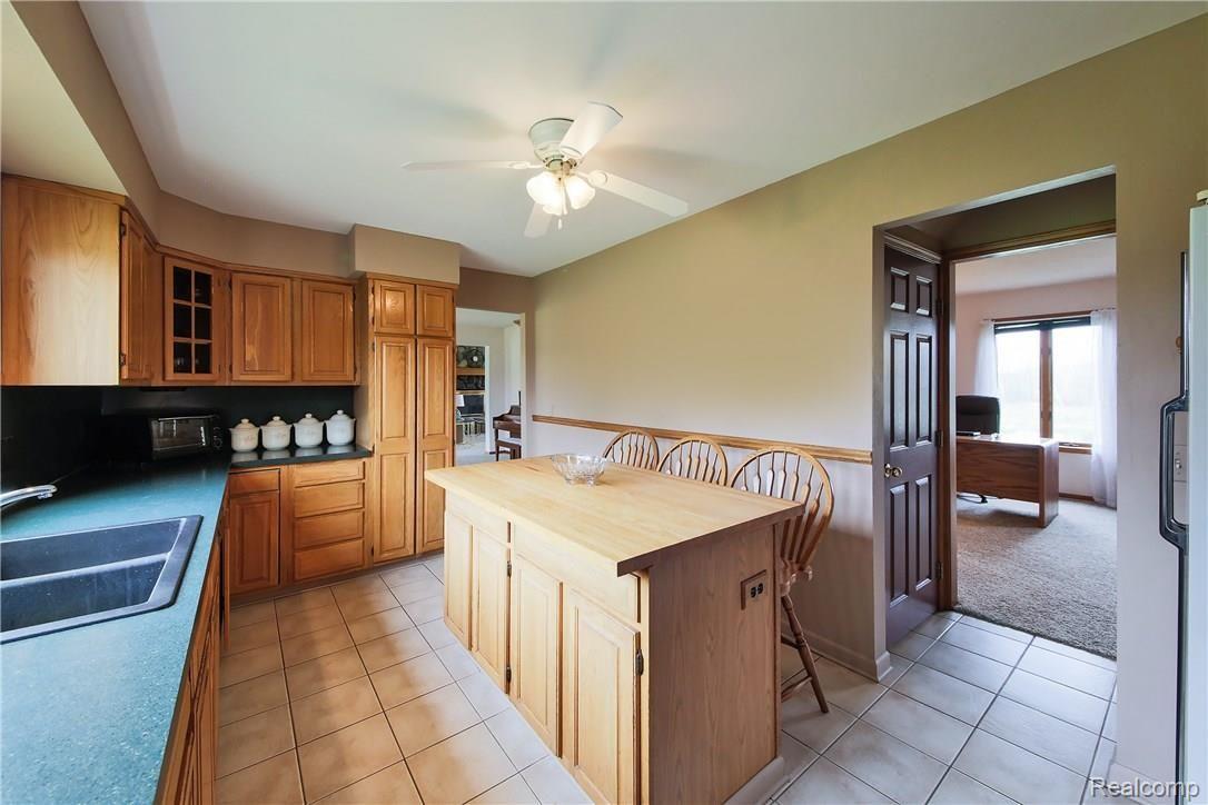 13637 Bliven Road Byron, MI 48418 - Photo 13 of 25 Snack bar island in the kitchen
