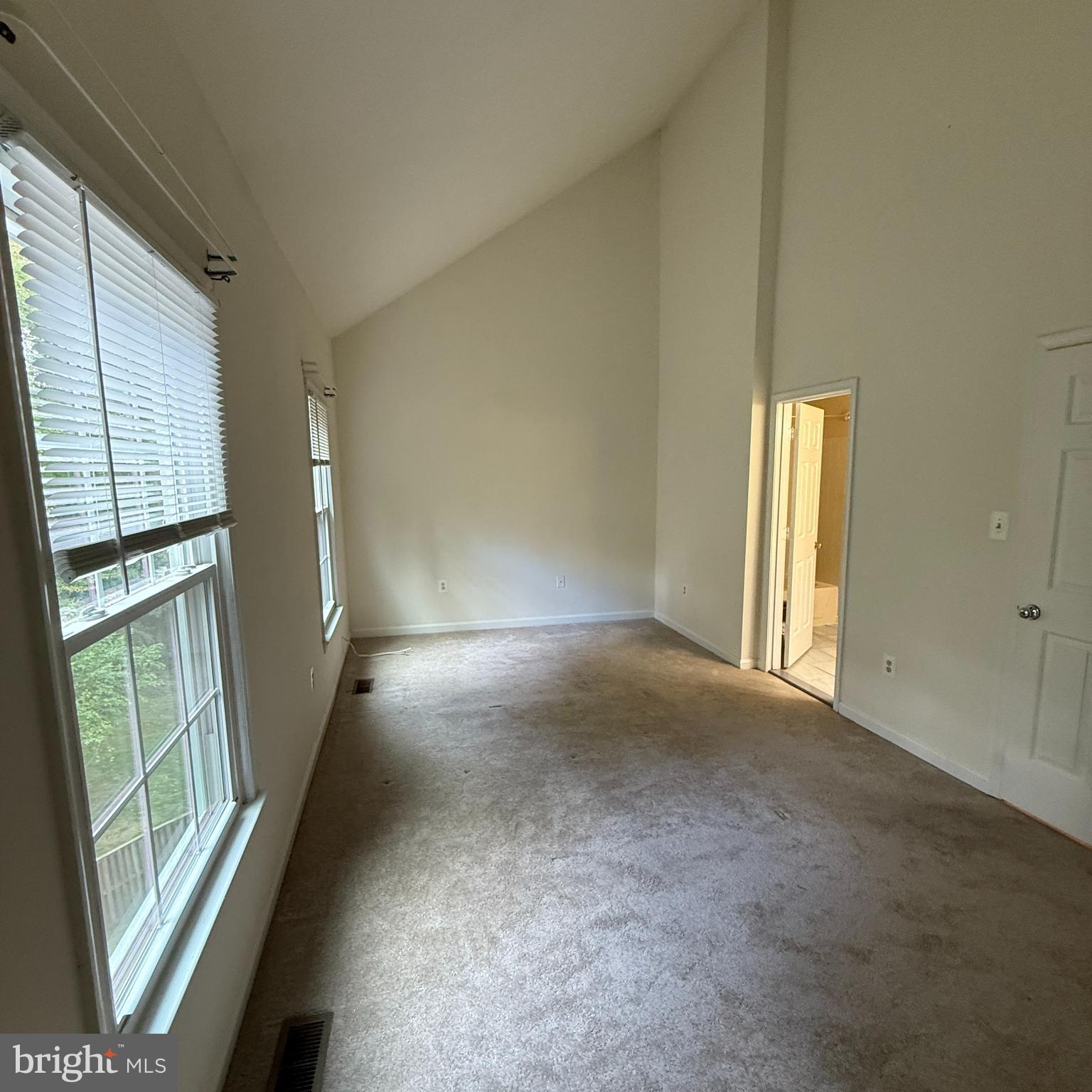 8222 Maple Ridge Avenue Springfield, VA 22153 - Photo 13 of 25 a view of empty room with windows