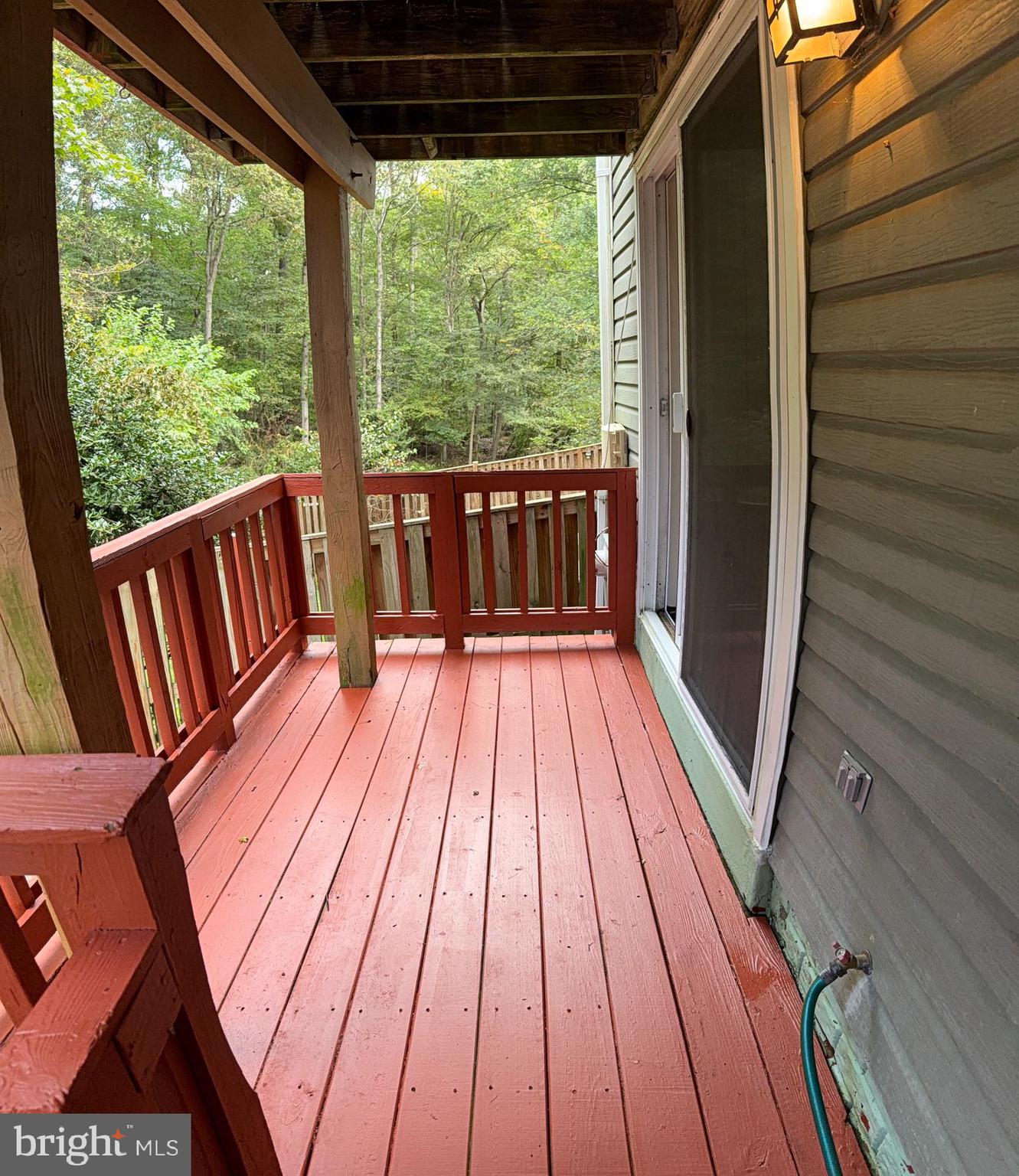8222 Maple Ridge Avenue Springfield, VA 22153 - Photo 24 of 25 a view of deck with wooden floor and outdoor space