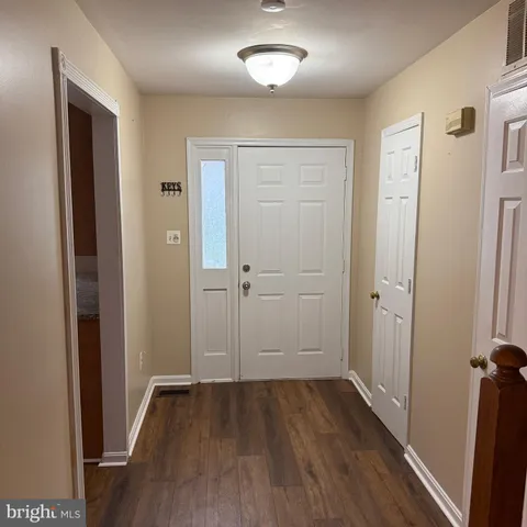 wooden floor & windows in a room