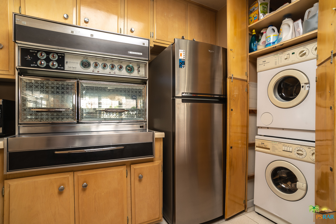 1811 Sandcliff Road Palm Springs, CA 92264 - Photo 14 of 44 Washer and dryer in kitchen