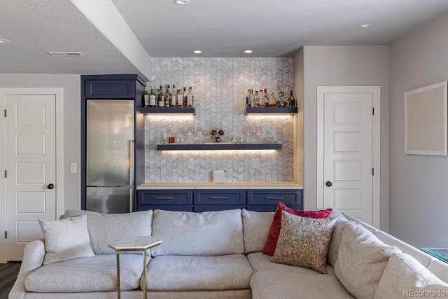 a kitchen with a cabinets and potted plant on the counter