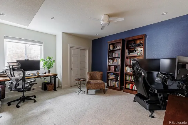 a bathroom with a granite countertop and a sink