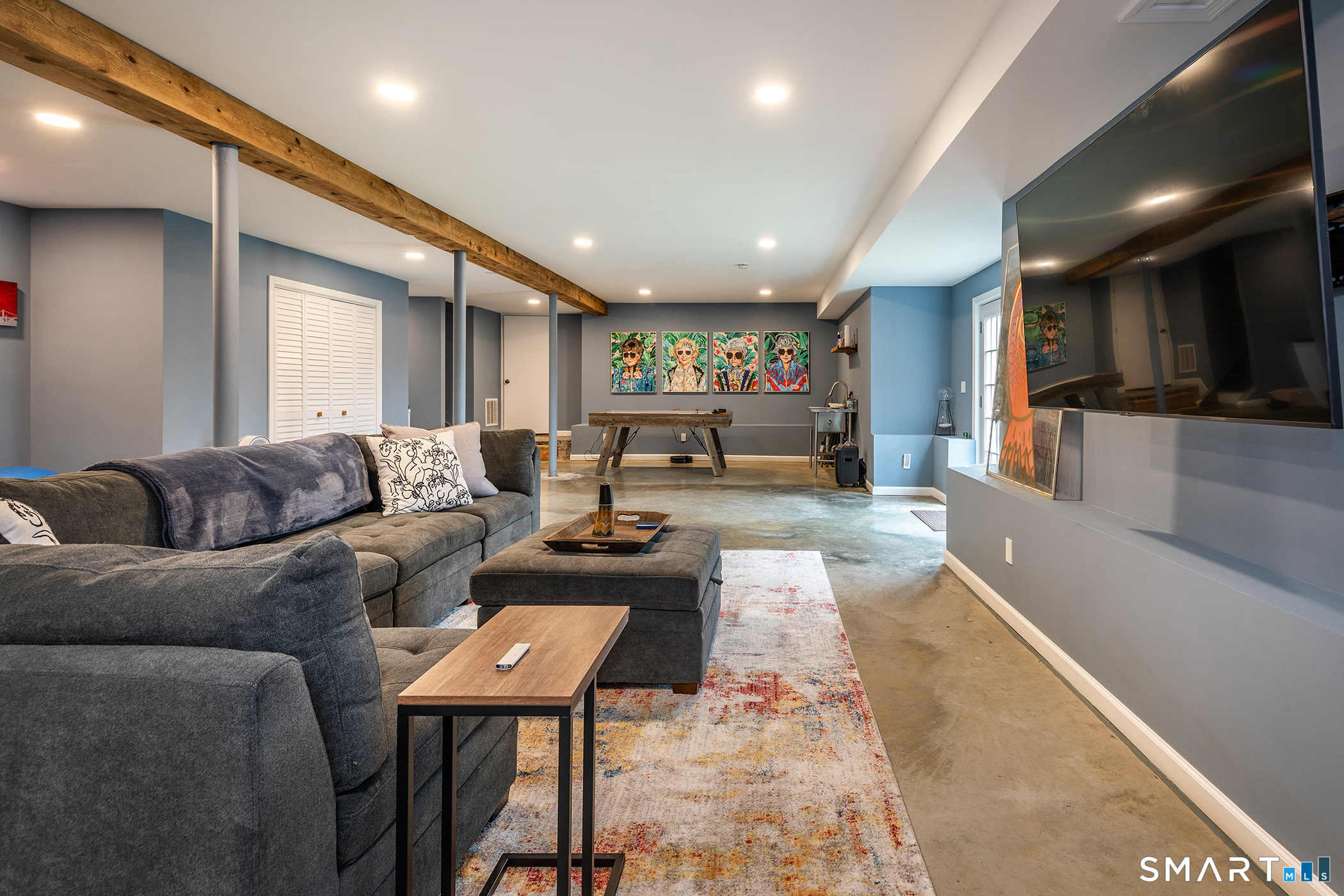 12 Silver Hill Road Sharon, CT 06069 - Photo 21 of 26 a living room with furniture and a flat screen tv