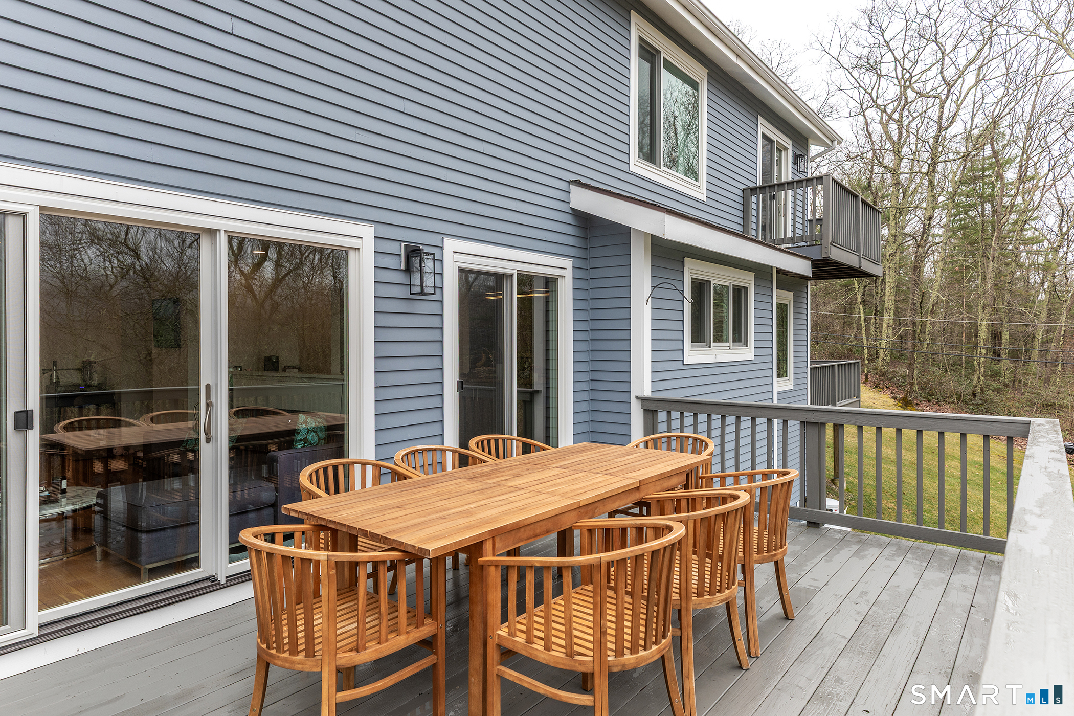 12 Silver Hill Road Sharon, CT 06069 - Photo 23 of 26 a patio with table and chairs and potted plants