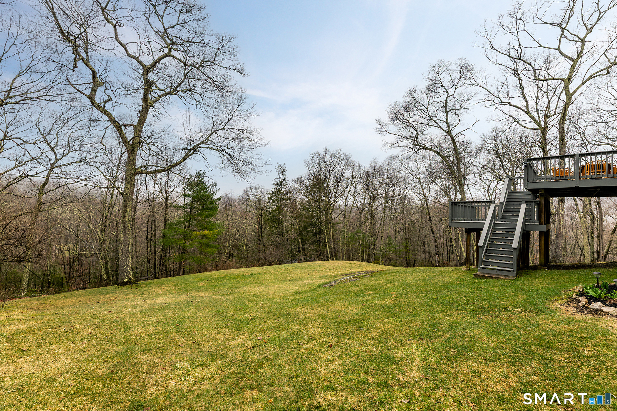 12 Silver Hill Road Sharon, CT 06069 - Photo 25 of 26 a backyard of a house with lots of green space