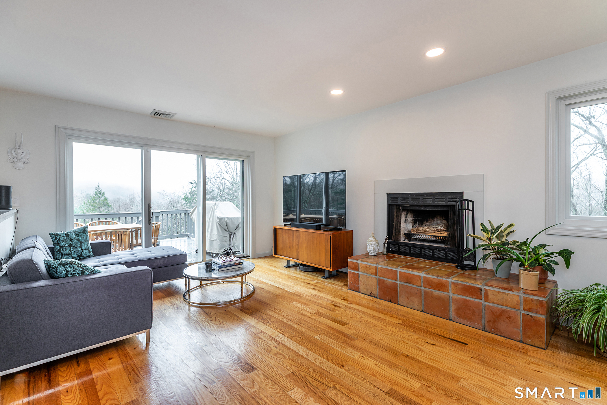 12 Silver Hill Road Sharon, CT 06069 - Photo 5 of 26 a living room with furniture and a fireplace