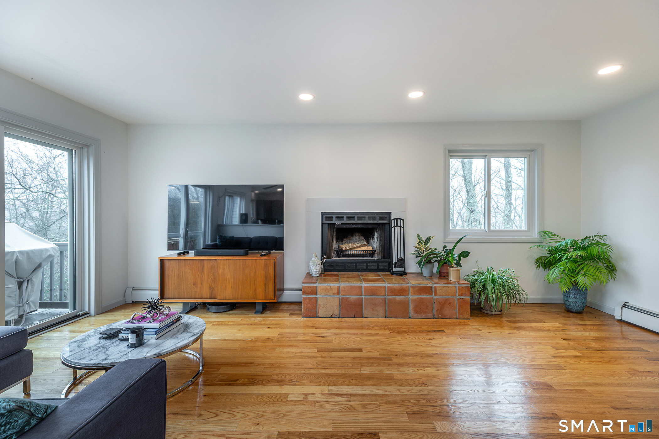 12 Silver Hill Road Sharon, CT 06069 - Photo 6 of 26 a living room with furniture and a flat screen tv