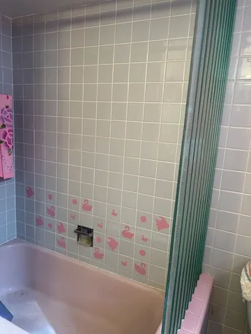 a bathroom with a bathtub