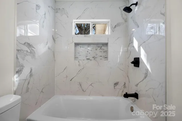 a bathroom with a bathtub