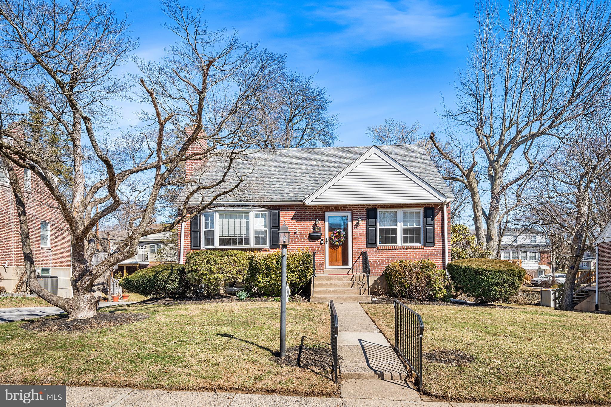 85 Rodmor Road Havertown, PA 19083 - Photo 1 of 1 a front view of a house with a yard