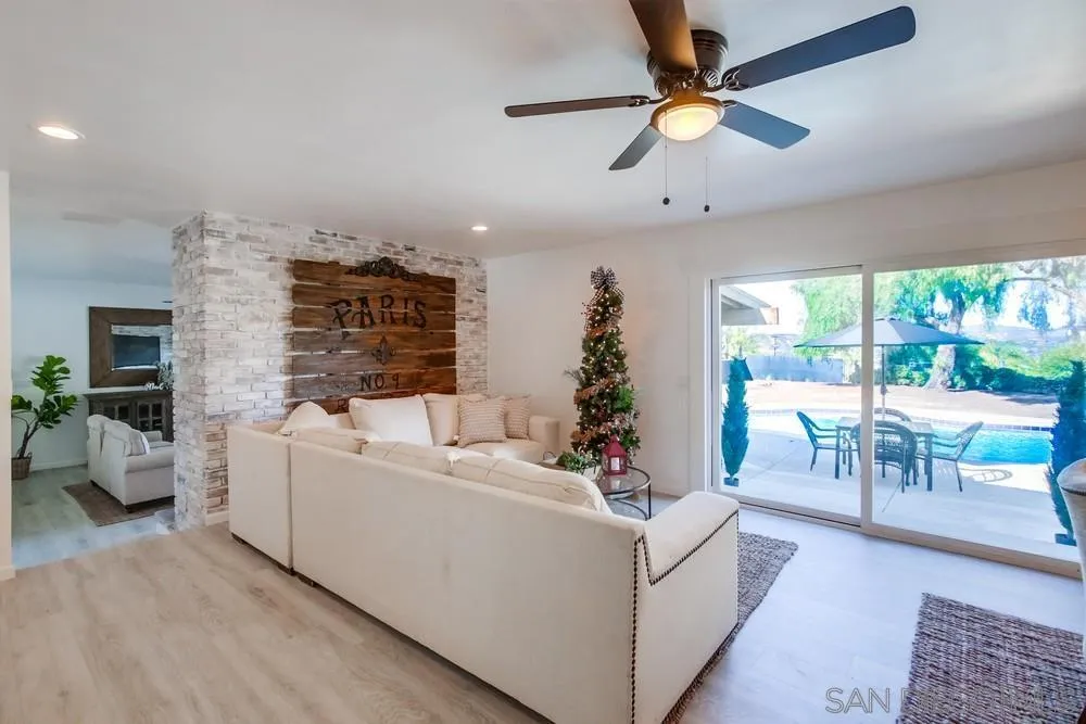 9130 Hillman Way Lakeside, CA 92040 - Photo 13 of 48 a living room with furniture and a large window