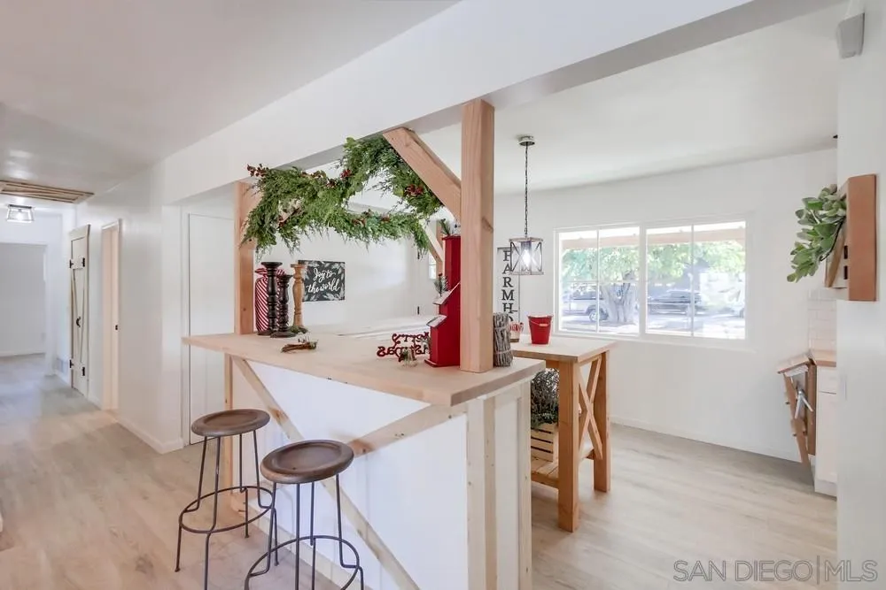 9130 Hillman Way Lakeside, CA 92040 - Photo 17 of 48 a view of a dining room with furniture and a window