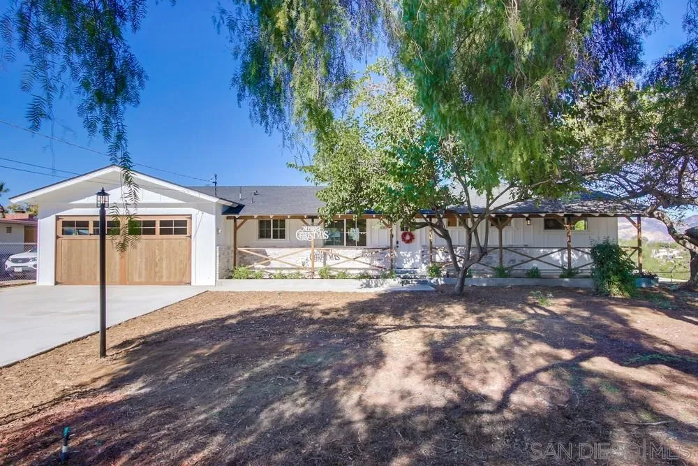9130 Hillman Way Lakeside, CA 92040 - Photo 2 of 48 a view of a house with a yard