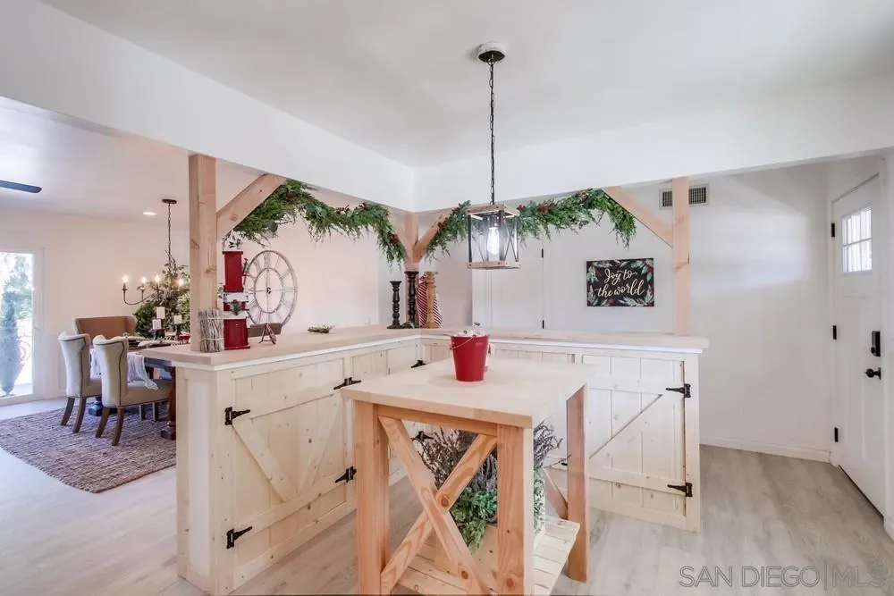 9130 Hillman Way Lakeside, CA 92040 - Photo 24 of 48 a view of an entryway with kitchen island table and chairs