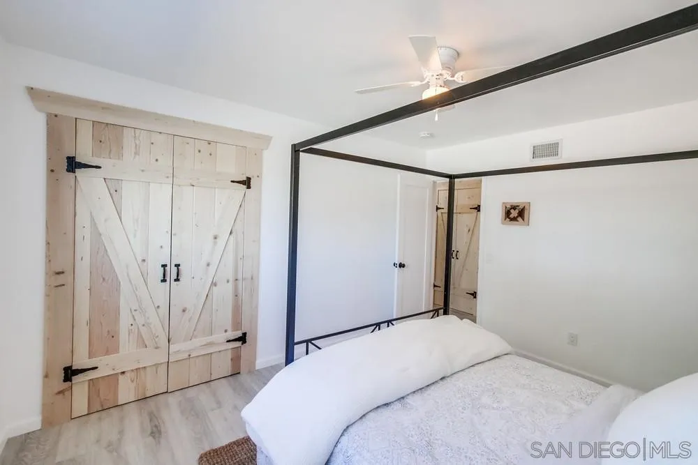 9130 Hillman Way Lakeside, CA 92040 - Photo 28 of 48 a bedroom with a bed and a shower