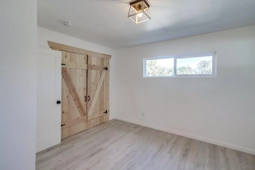 9130 Hillman Way Lakeside, CA 92040 - Photo 32 of 48 an empty room with windows