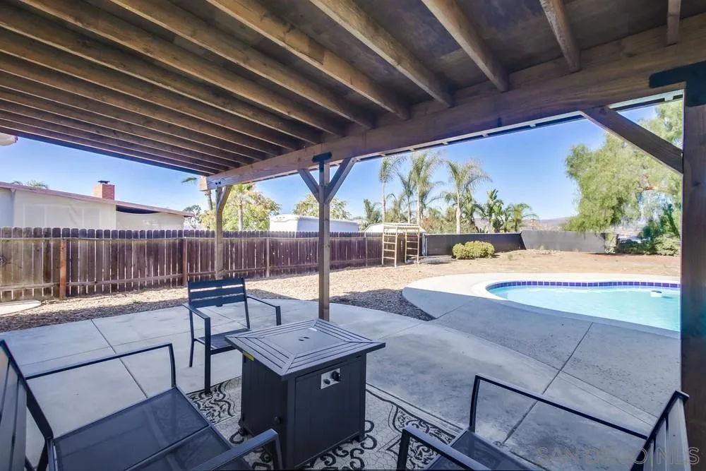 9130 Hillman Way Lakeside, CA 92040 - Photo 38 of 48 a view of a patio with a table and chairs