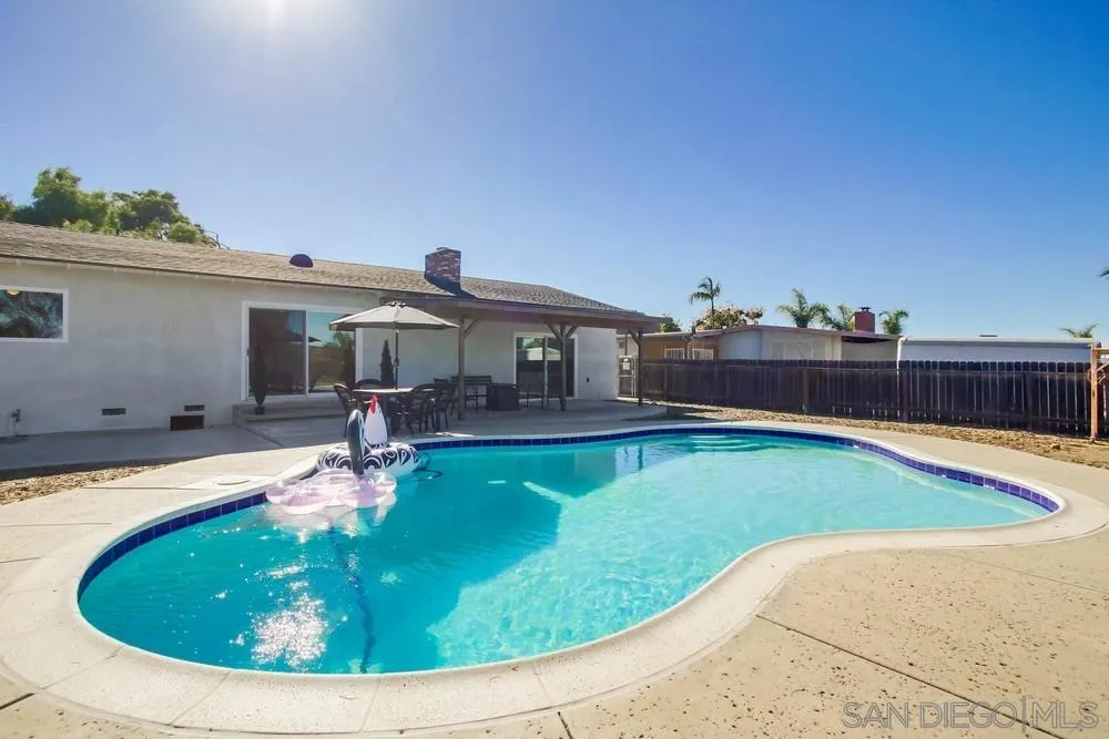 9130 Hillman Way Lakeside, CA 92040 - Photo 40 of 48 a view of a house with swimming pool