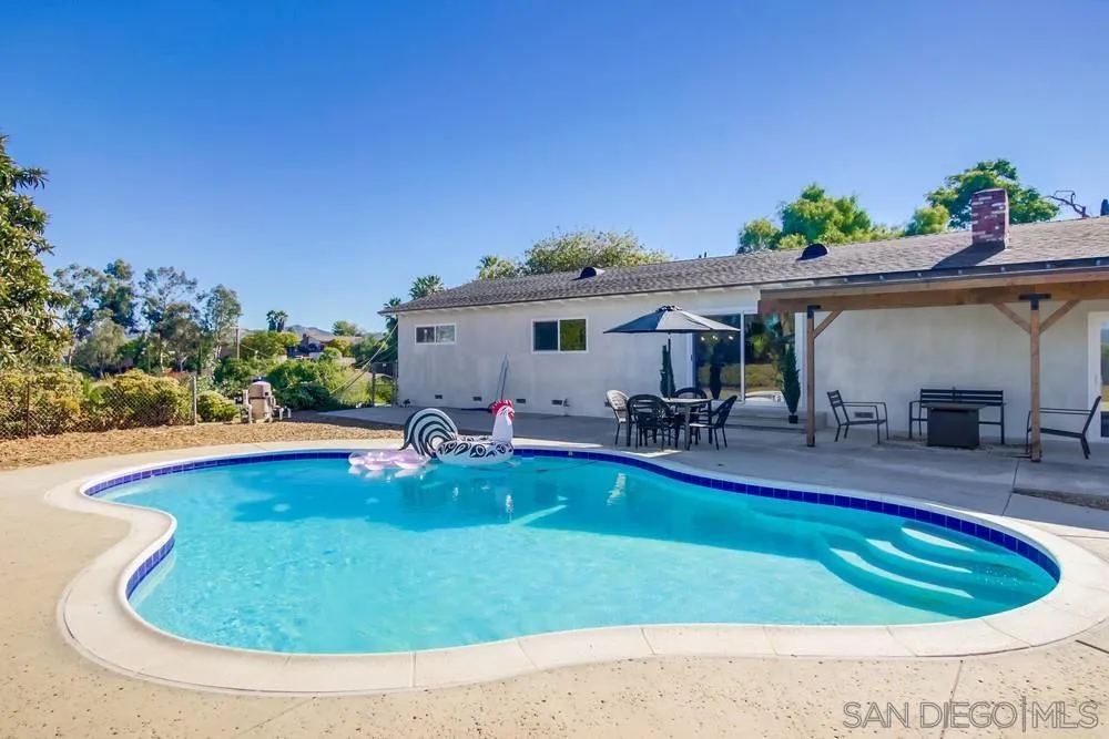 9130 Hillman Way Lakeside, CA 92040 - Photo 44 of 48 a view of a swimming pool with outdoor seating
