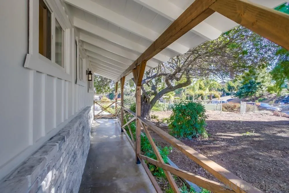 9130 Hillman Way Lakeside, CA 92040 - Photo 6 of 48 a view of a pathway of a house with wooden fence