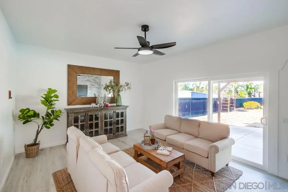 9130 Hillman Way Lakeside, CA 92040 - Photo 7 of 48 a living room with furniture and a large window