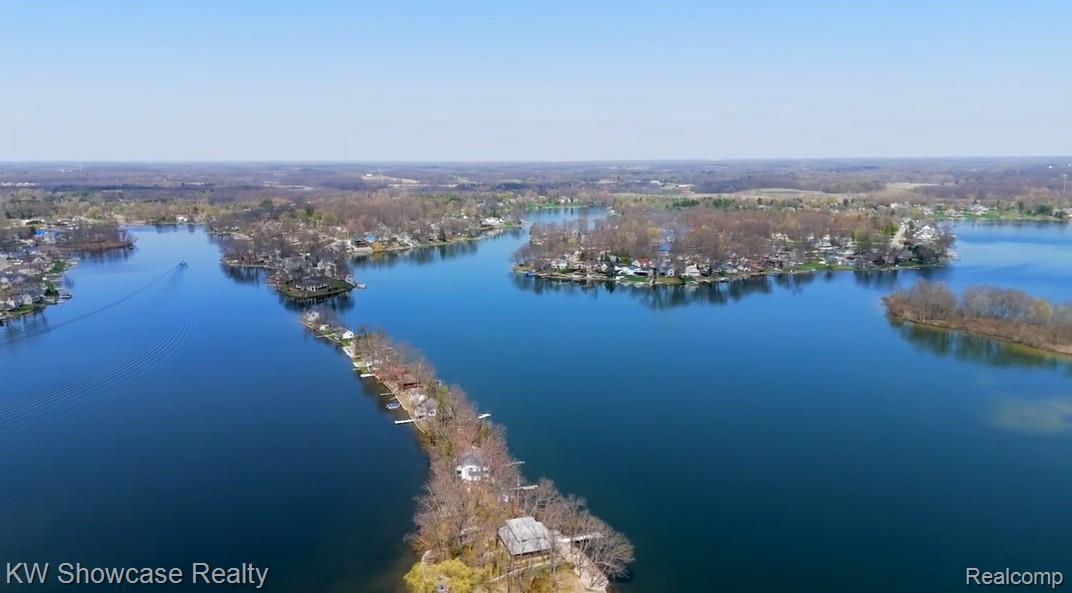 6354 Bennett Lake Road Fenton, MI 48430 - Photo 9 of 41 Aerial view of a nearby body of water