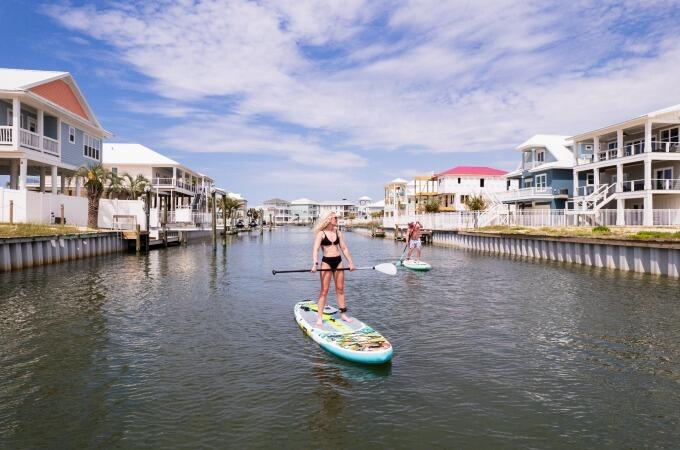 2825 Teepee Road Navarre, FL 32566 - Photo 5 of 12 a swimming pool with outdoor seating and water view
