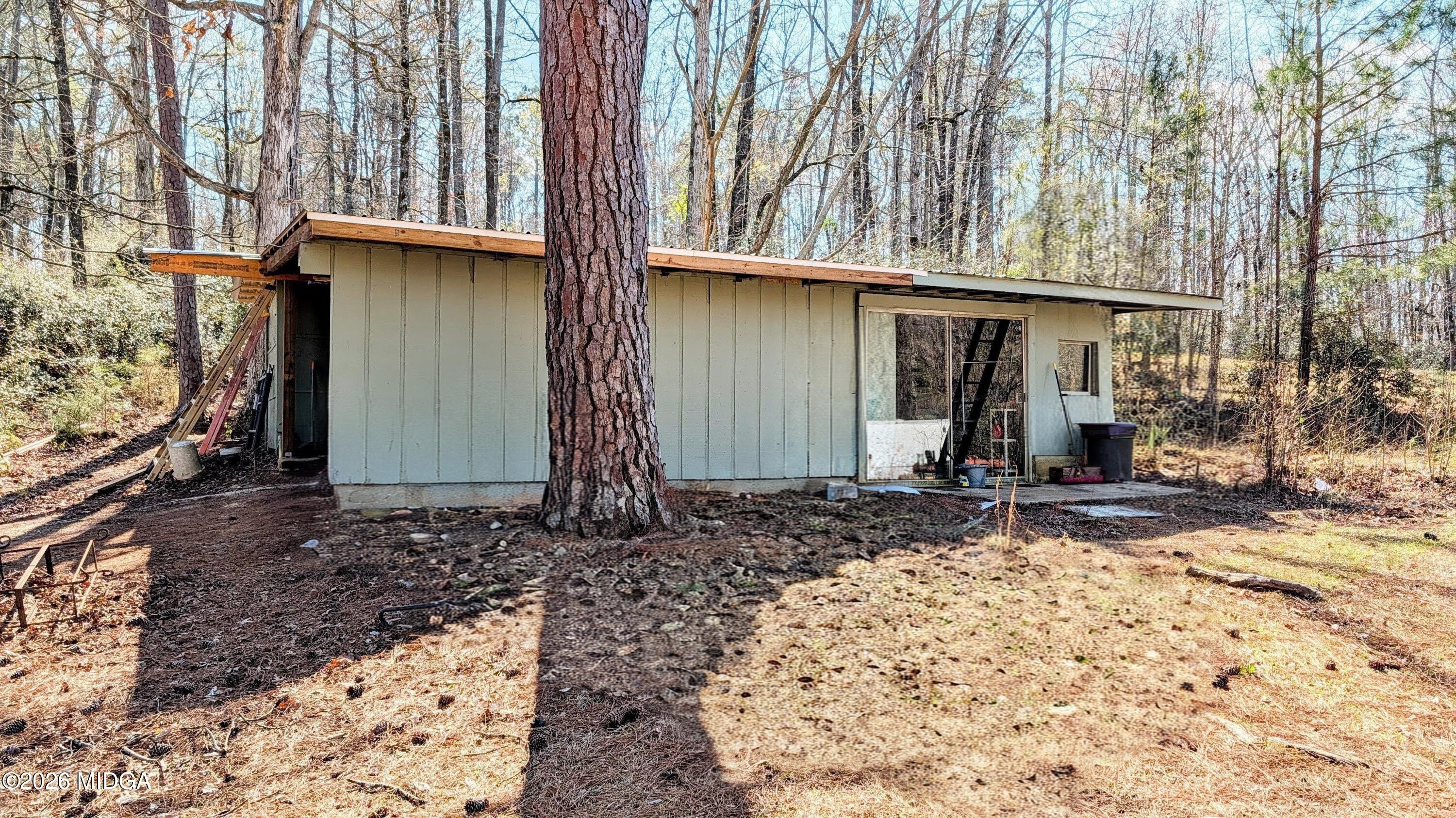 1068 Lamar Road Macon, GA 31210 - Photo 25 of 39 a view of a house with a yard