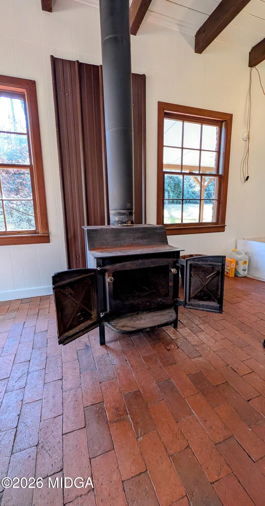 1068 Lamar Road Macon, GA 31210 - Photo 30 of 39 a living room with a large window and a table