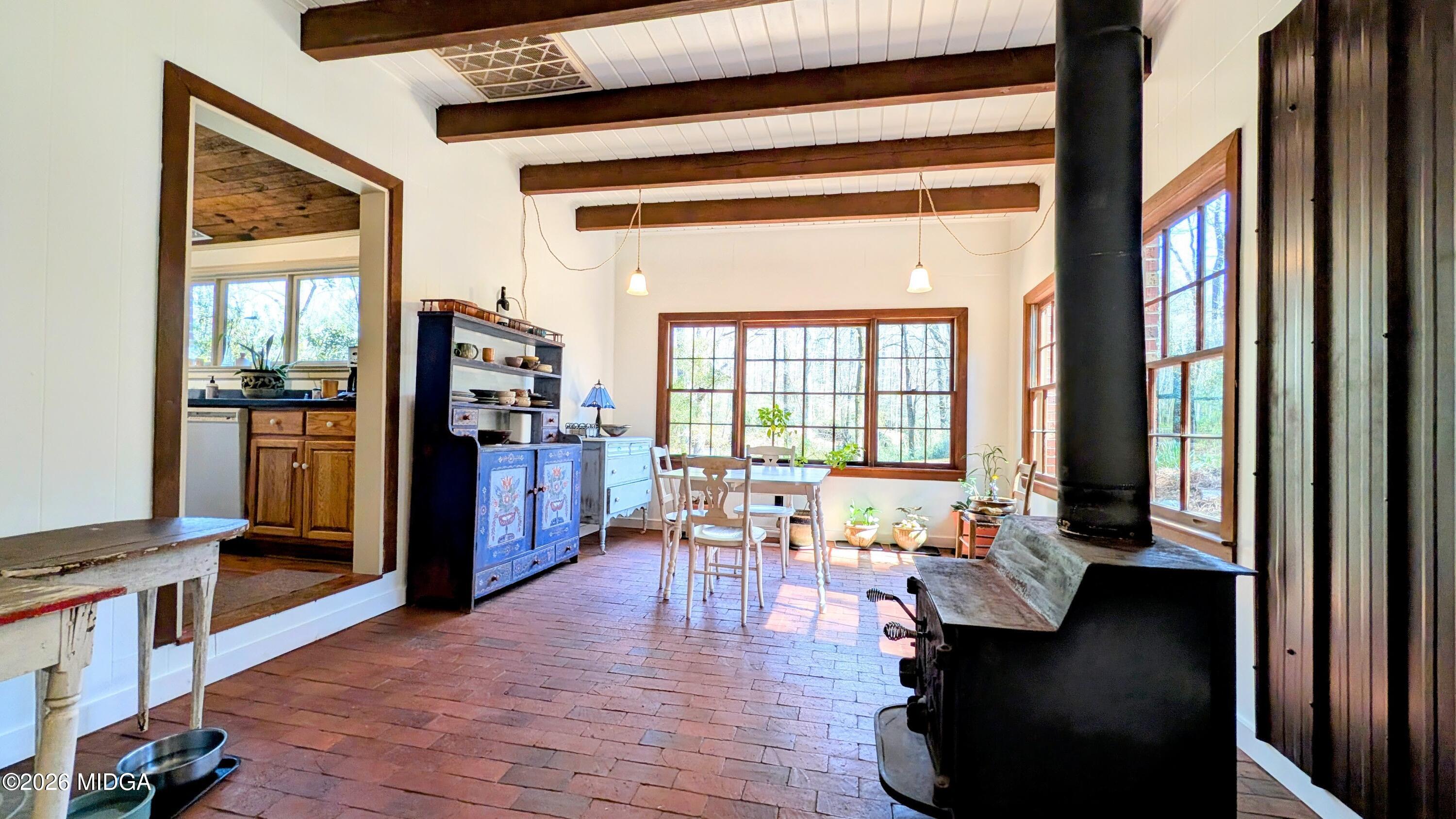 1068 Lamar Road Macon, GA 31210 - Photo 5 of 39 a living room with furniture and large windows