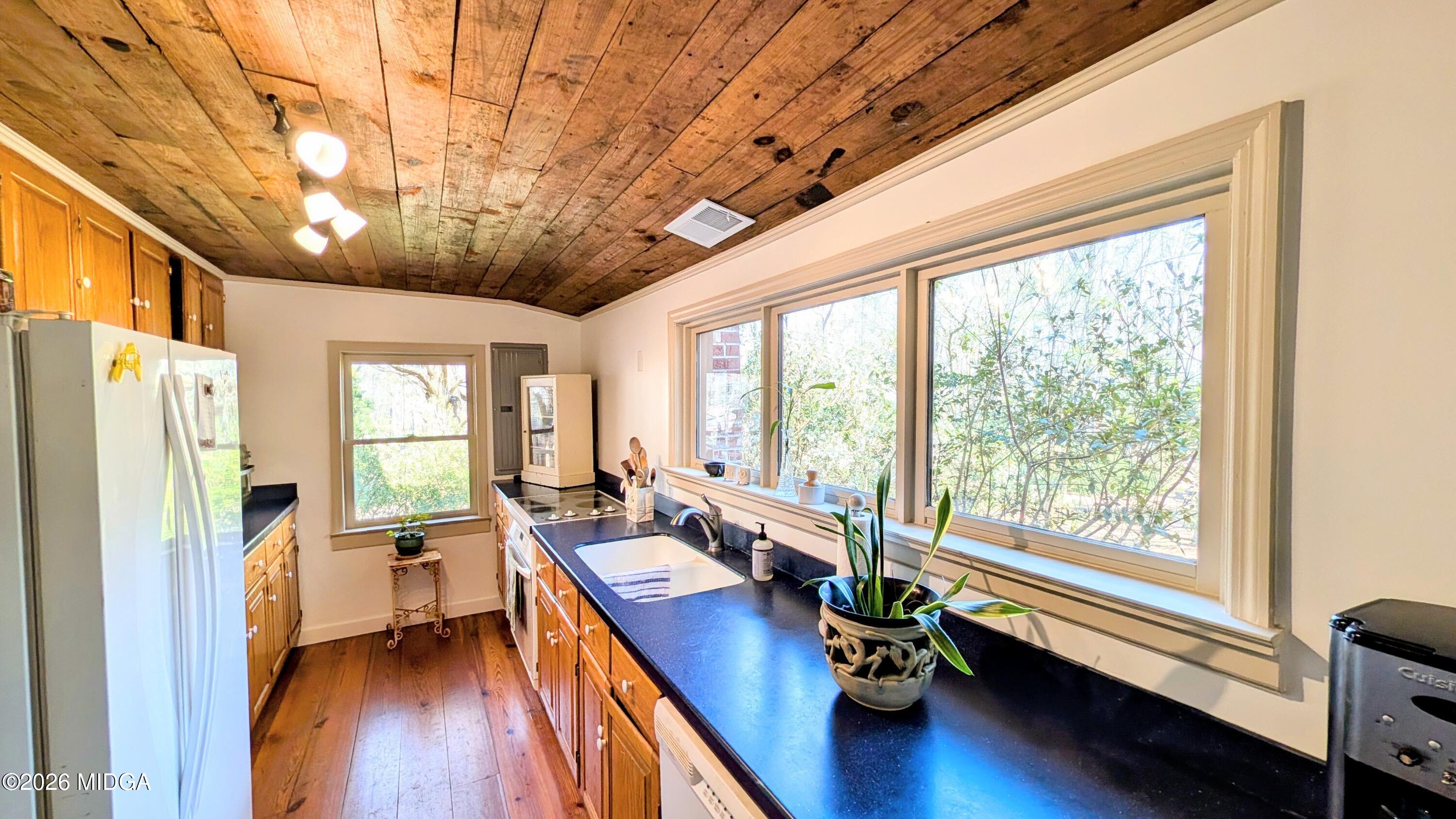 1068 Lamar Road Macon, GA 31210 - Photo 6 of 39 a very nice looking room with a large window and wooden floor