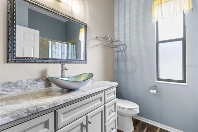 a bathroom with a shower and a bath tub