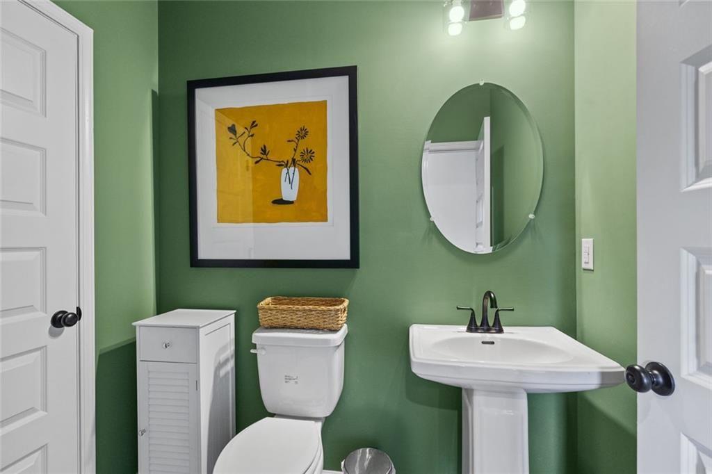 156 Saddle Ridge Trail Jasper, GA 30143 - Photo 20 of 45 a bathroom with a toilet sink and mirror