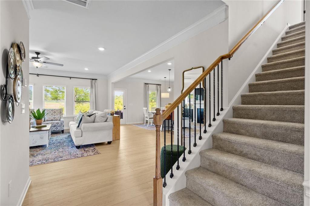 156 Saddle Ridge Trail Jasper, GA 30143 - Photo 22 of 45 a living room with furniture and stairs