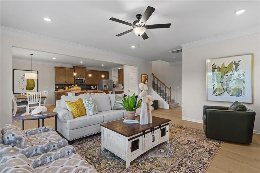 156 Saddle Ridge Trail Jasper, GA 30143 - Photo 7 of 45 a living room with furniture and wooden floor