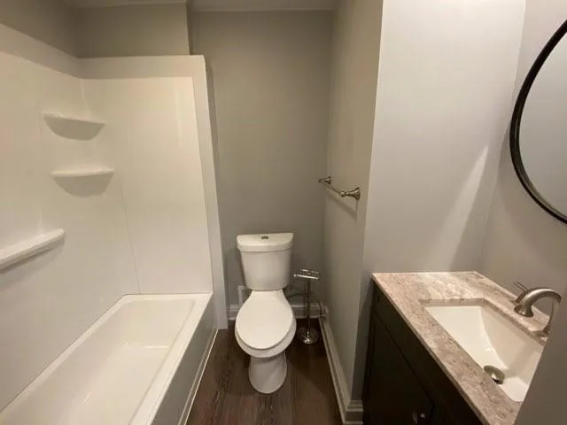 a bathroom with a sink and a toilet