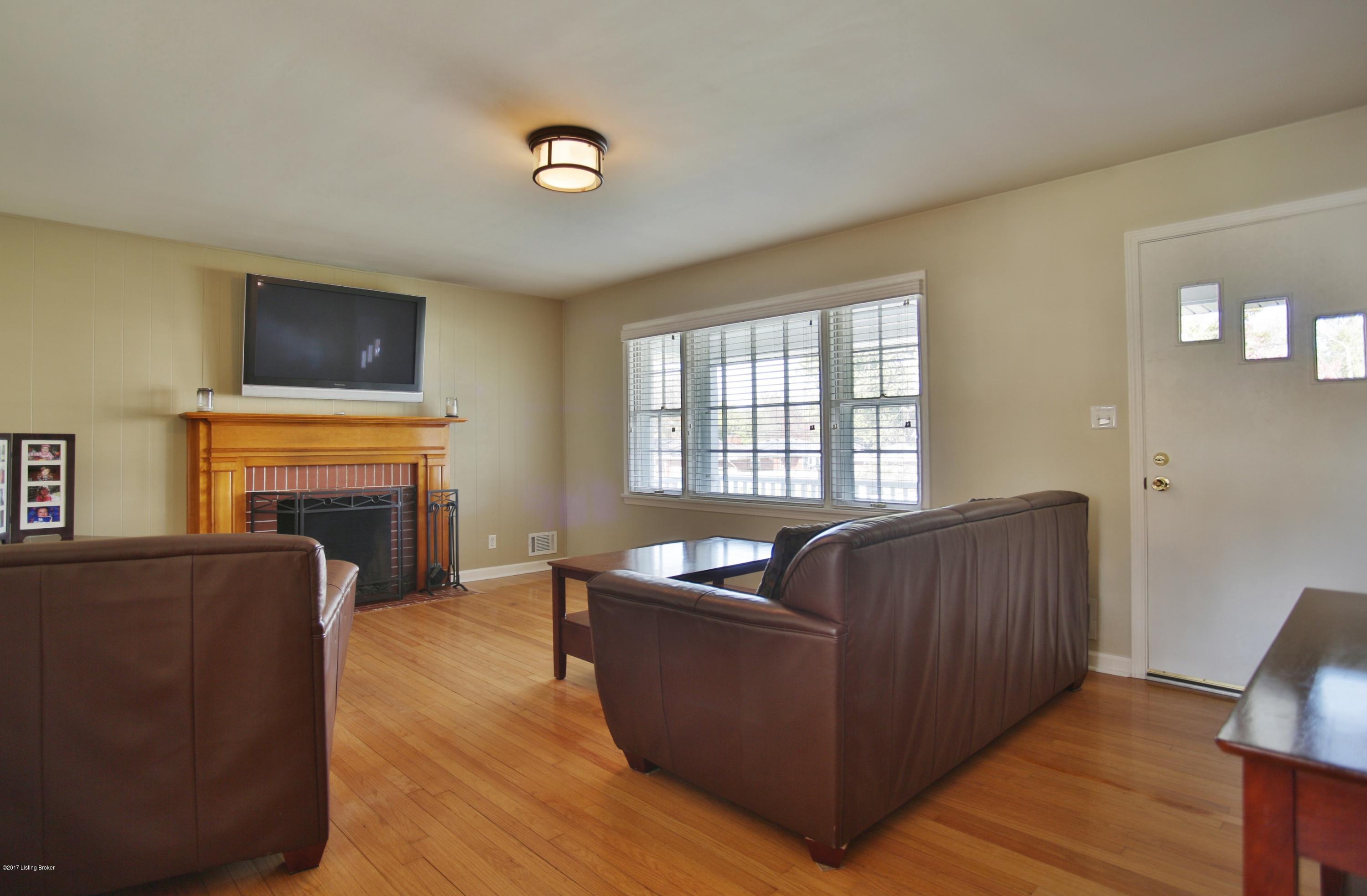 Front entry leading to gorgeous light-filled Living room