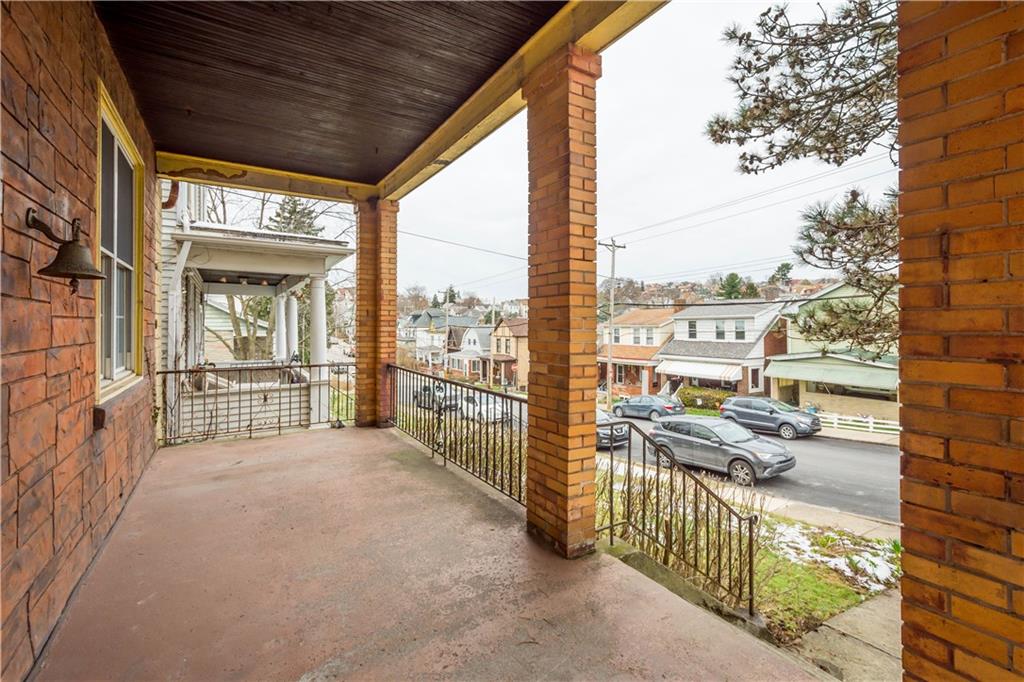 208 Linnview Avenue Pittsburgh, PA 15210 - Photo 11 of 26 a view of a porch with backyard of the house