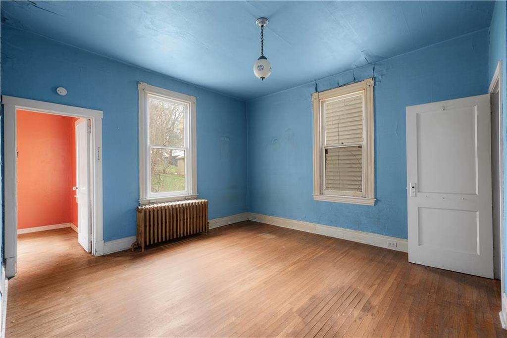 208 Linnview Avenue Pittsburgh, PA 15210 - Photo 18 of 26 an empty room with windows and closet