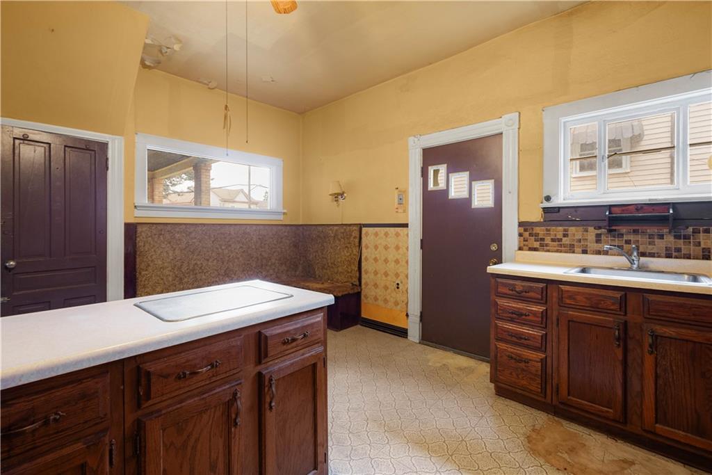 208 Linnview Avenue Pittsburgh, PA 15210 - Photo 20 of 26 a bathroom with a sink a vanity and a mirror