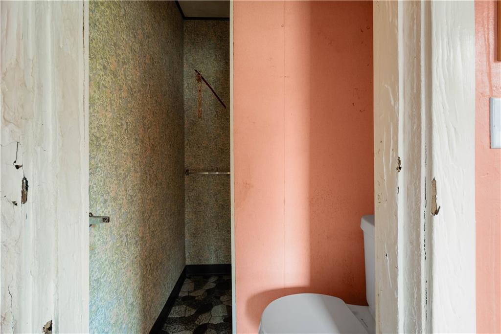 208 Linnview Avenue Pittsburgh, PA 15210 - Photo 23 of 26 a bathroom with a sink and a toilet
