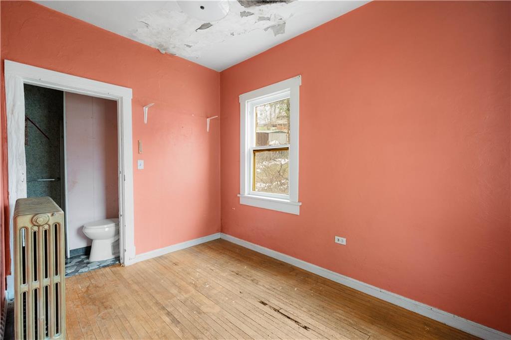 208 Linnview Avenue Pittsburgh, PA 15210 - Photo 24 of 26 a view of an empty room with a window