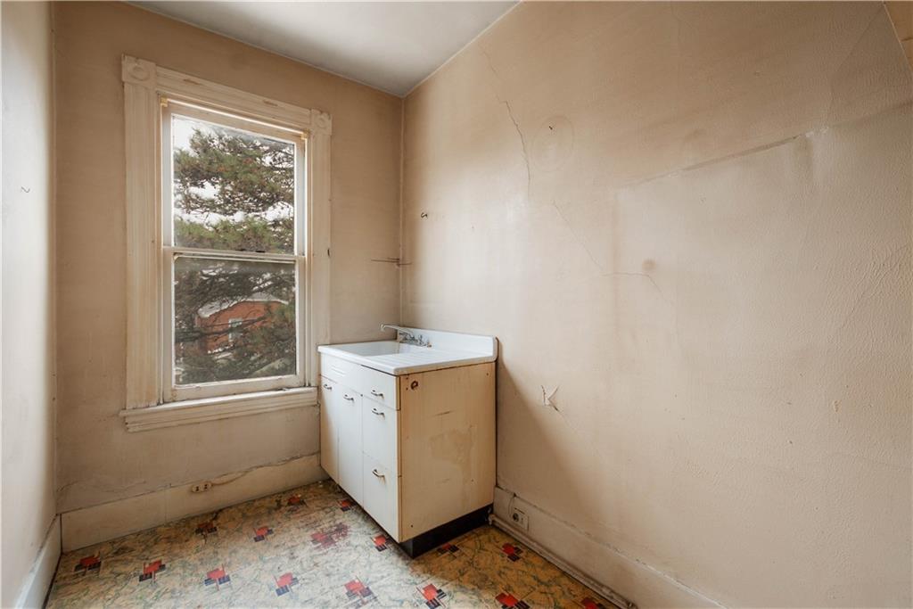 208 Linnview Avenue Pittsburgh, PA 15210 - Photo 26 of 26 a utility room with a window