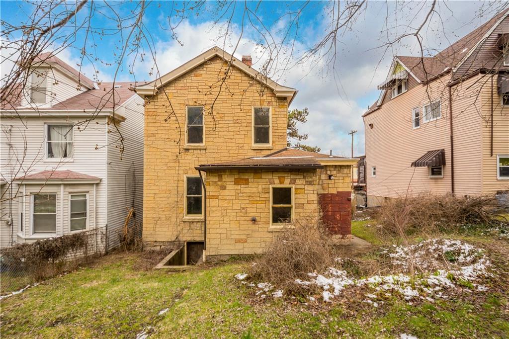 208 Linnview Avenue Pittsburgh, PA 15210 - Photo 3 of 26 a front view of a house with a yard