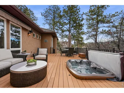 swimming pool view with a seating space